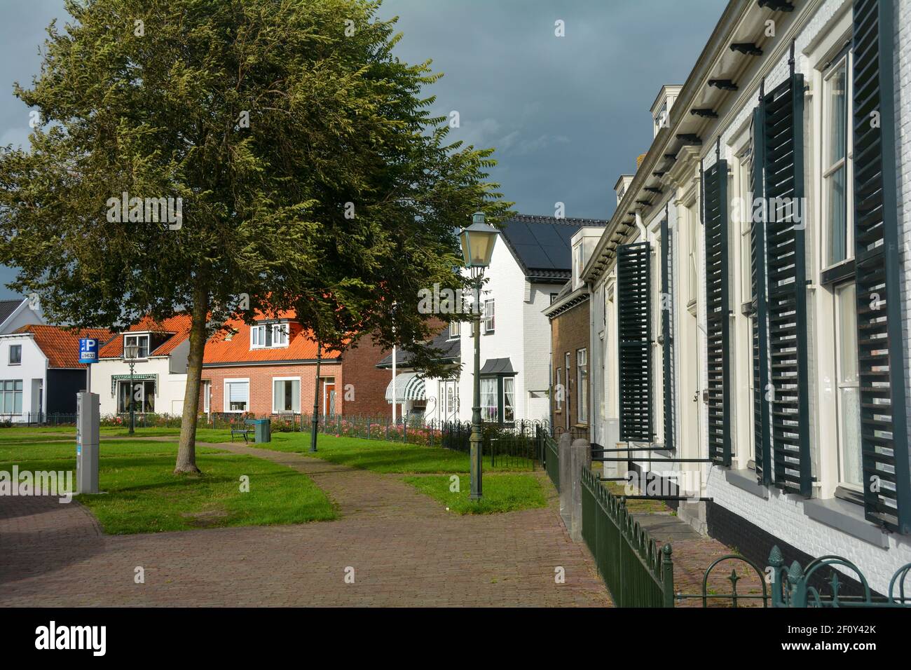 Street and houses in the town of Renesse, Zeeland, Netherlands Stock Photo