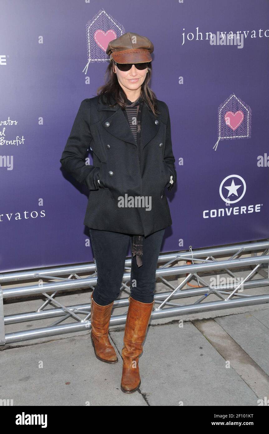 Gina Gershon. 8 March, 2009, Los Angeles, CA. Bring Your Heart To Our House John  Varvatos Partners With Converse For The 7th Annual Stuart House Benefit at  the John Varvatos store. Photo