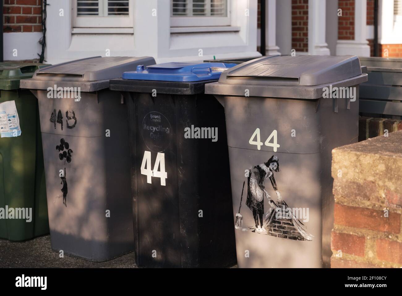 Banksy on rubbish bins Stock Photo Alamy