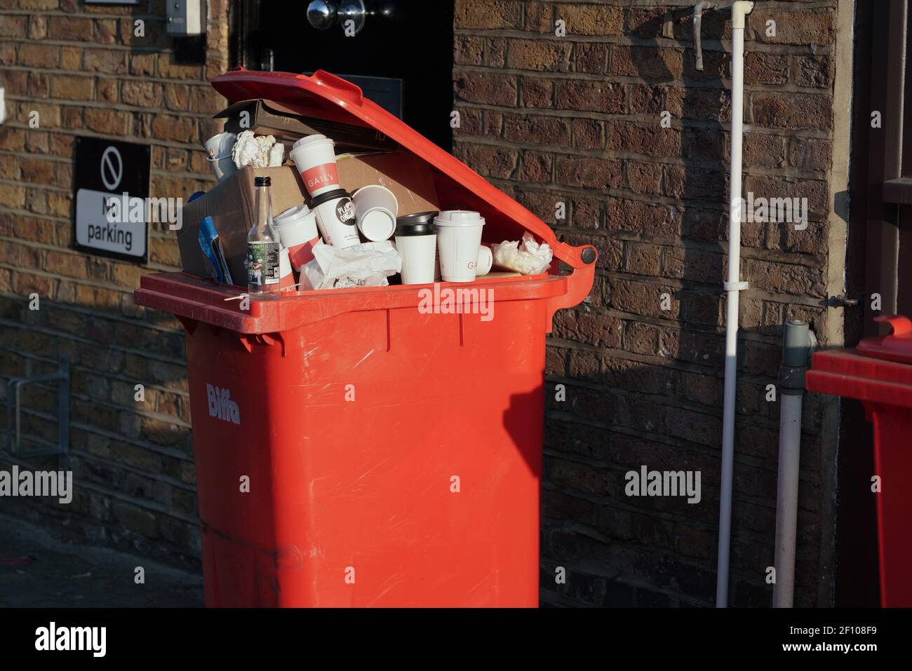 rubbish bin full of coffee cups Stock Photo Alamy