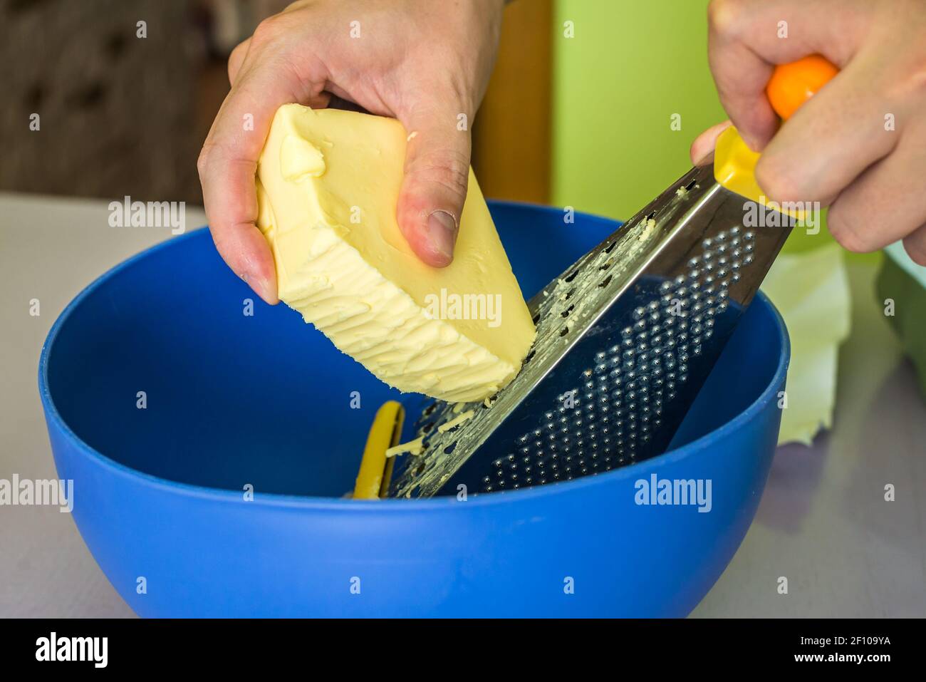 Hand shredded butter with grated Stock Photo Alamy