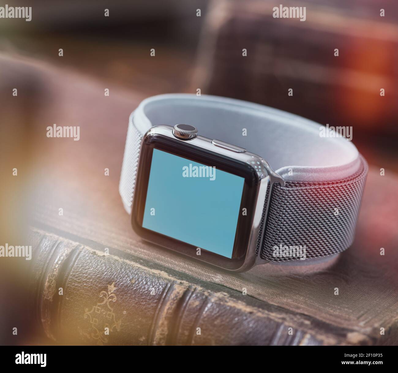 Mockup of smart-watch on the book. Clipping path Stock Photo
