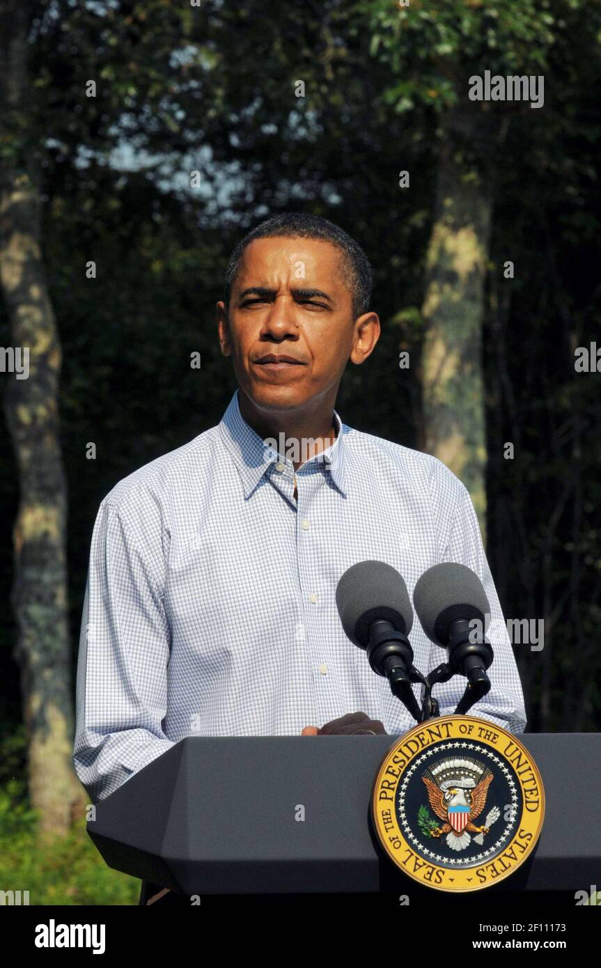 26 August 2009 - Chilmark, Massachusetts - President Barack Obama delivers a statement on the death of Senator Edward M. Kennedy at his vacation rental home in Chilmark, Massachusetts on the island of Martha's Vineyard August 26, 2009. Photo Credit: Neal Hamberg / Pool/Sipa Press/0908261642 Stock Photo