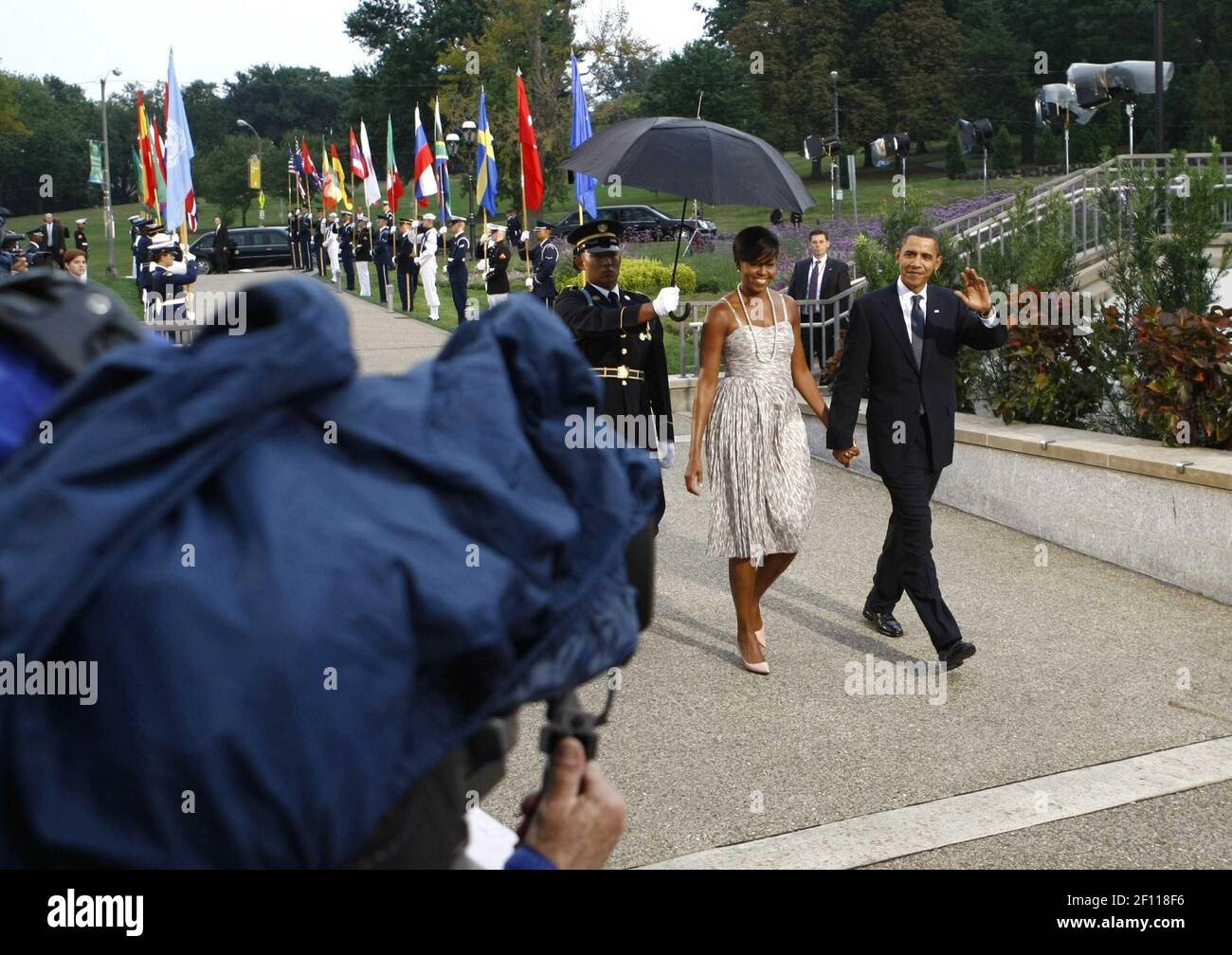 24 September 2009 - Pittsburgh, Pennsylvania - U.S. President Barack Obama and first lady Michelle Obama arrive to the welcoming dinner for G-20 leaders at the Phipps Conservatory on September 24, 2009 in Pittsburgh, Pennsylvania. Heads of state from the world's leading economic powers arrived today for the two-day G-20 summit held at the David L. Lawrence Convention Center aimed at promoting economic growth. Photo Credit: Win McNamee/Pool/Sipa Press/0909251418 Stock Photo