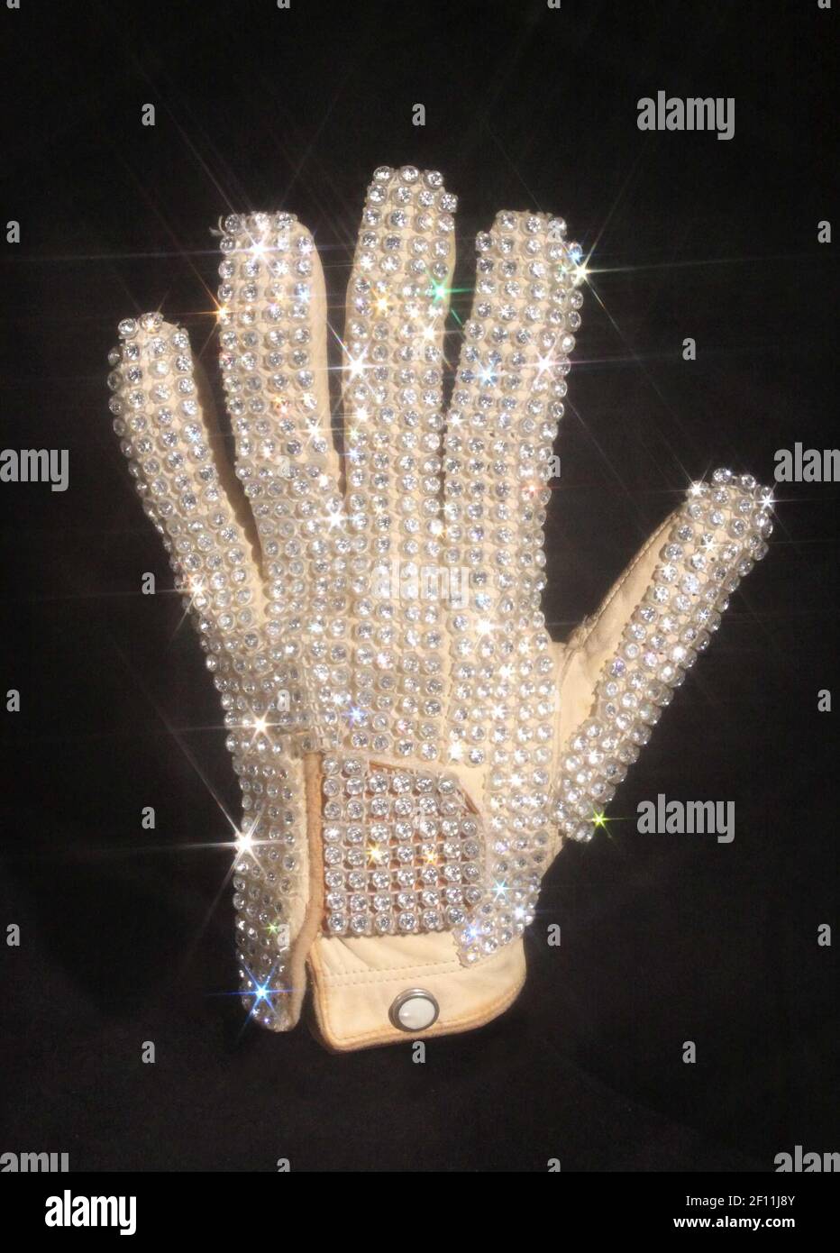 November 2009 - New York, NY - Michael Jackson's glove from his 1983 performance of Billie Jean at the Motown 25 television special where he performed the Moonwalk for the first time. Photo Credit: Julien's Auctions/Sipa Press/0911132141 Stock Photo