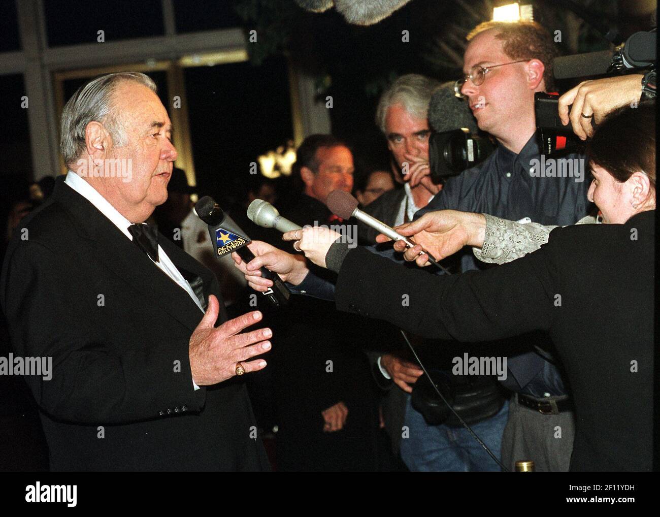 Jonathan Winters speaks to reporters as he arrives at the John F. Kennedy Center for the Performing Arts in Washington, D.C. to accept the 'Mark Twain Prize' for comedy on October 20, 1999. Winters passed away on April 11, 2013 at age 87. Photo Credit: Ron Sachs/CNP/AdMedia/Sipa USA Stock Photo