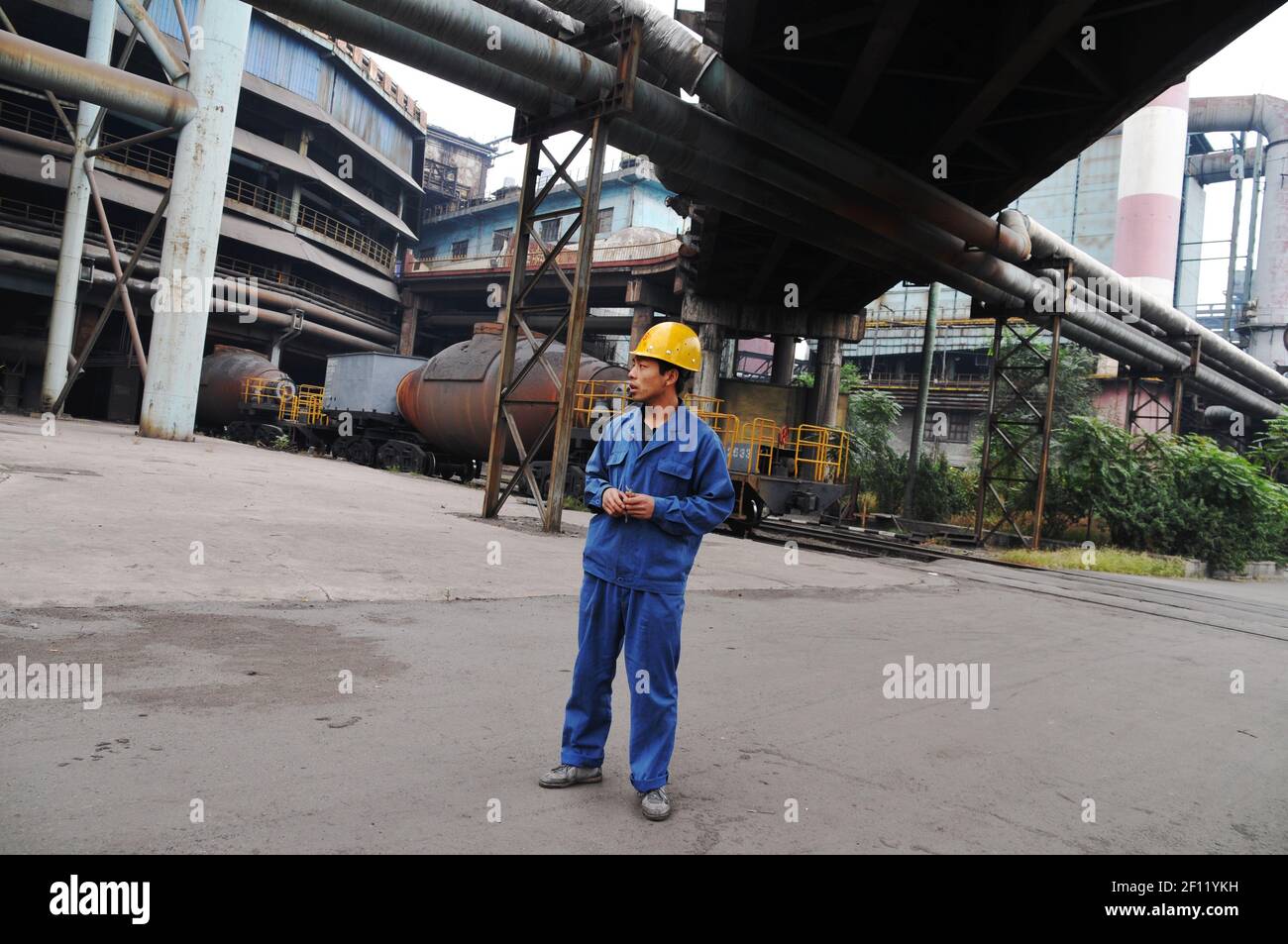 A Shougang's worker. (Photo by Raphael Fournier/Sipa USA) Stock Photo