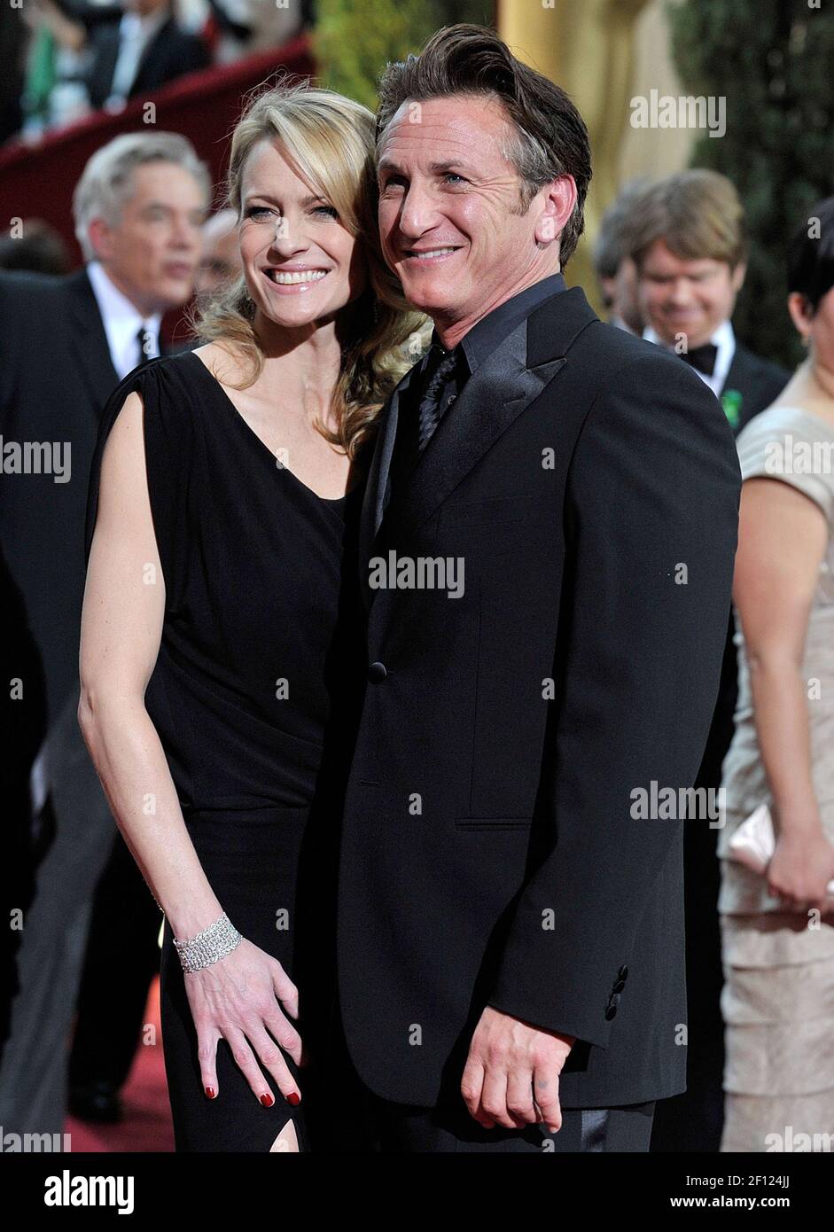 Actor Sean Penn, right, nominated for an Oscar for Best Actor in a Leading  Role for his work in "Milk," arrives with his wife and actress Robin Wright  at the 81st annual