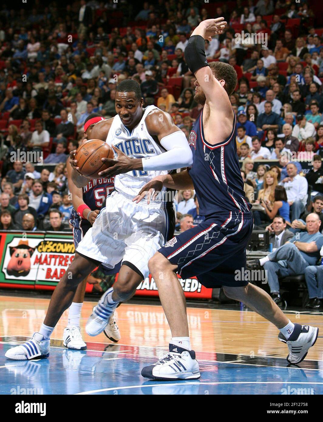Orlando Magic center Dwight Howard drives on New Jersey Nets Brook Lopez at the Amway Arena in Orlando Florida on Sunday February 8 2009. Photo by Jacob Langston Orlando Sentinel MCT Sipa USA Stock Ph...