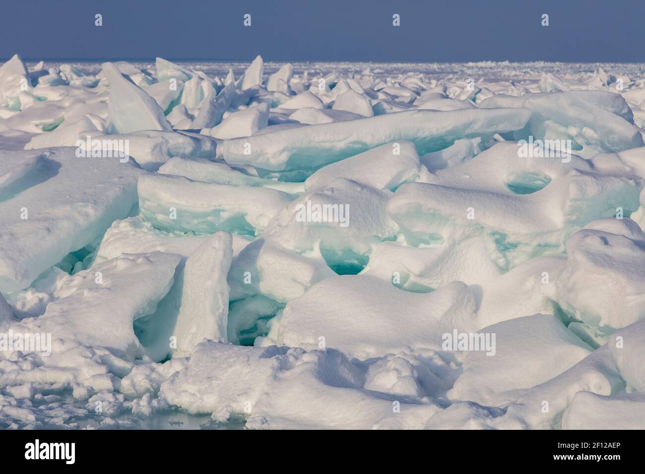 Ice build-up, Straits of Mackinac, between Lake Michigan and Lake Huron, Michigan, USA, February, by James D Coppinger/Dembinsky Photo Assoc Stock Photo