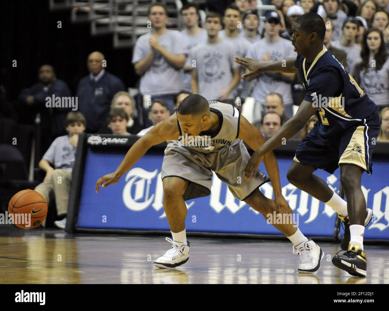 Georgetown guard Chris Wright (4) loses control of the ball while defended by Pittsburgh's Ashton Gibbs, right, during the first half at the Verizon Center in Washington, D.C., Saturday, January 3, 2009. Pitt defeated Georgetown, 70-54. (Photo by Chuck Myers/MCT/Sipa USA) Stock Photo