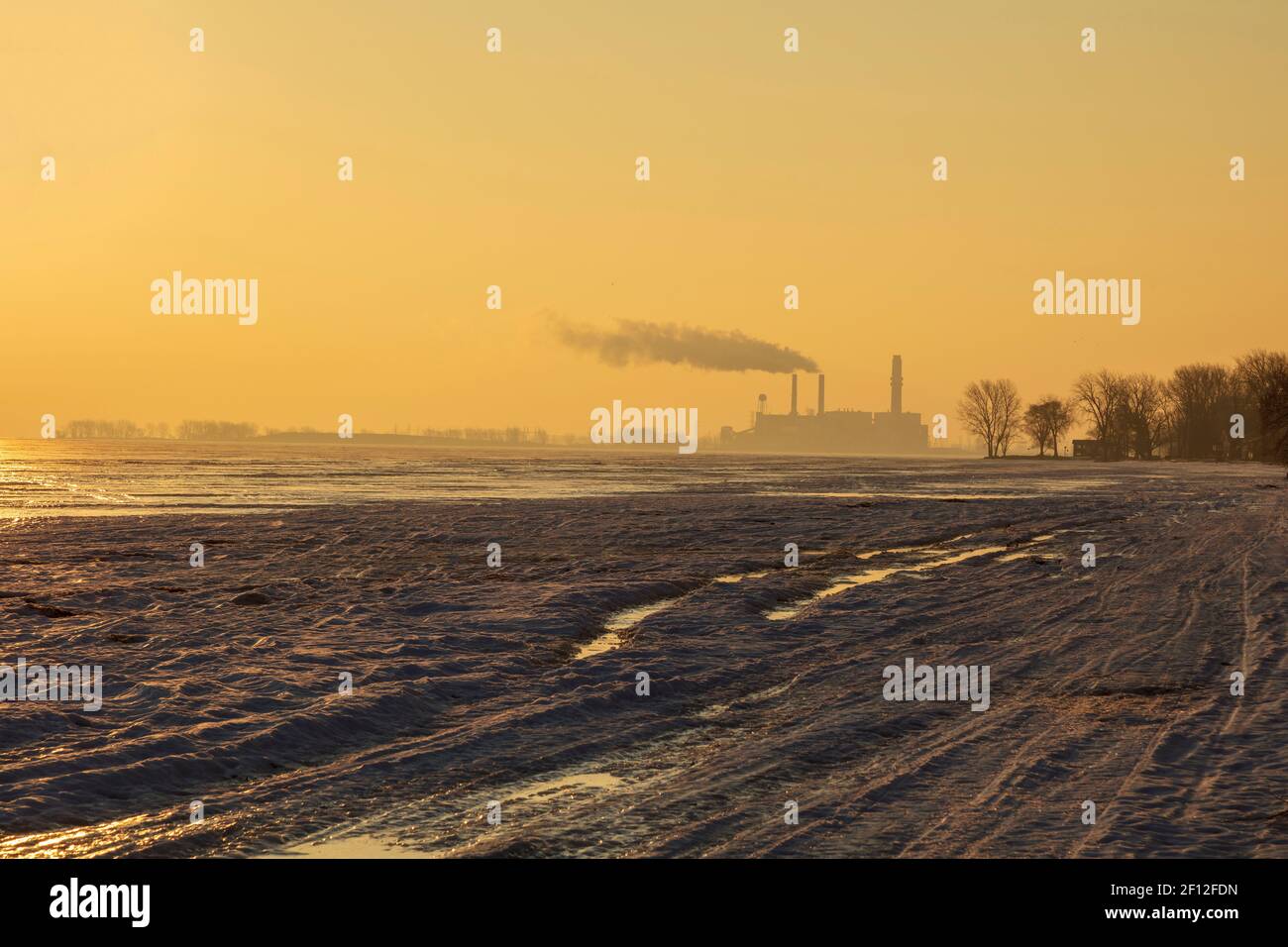 Coal-fired Power Plant, near the Saginaw Bay, Sunrise, Bay City, Michigan, Winter, by James D Coppinger/Dembinsky Photo Assoc Stock Photo