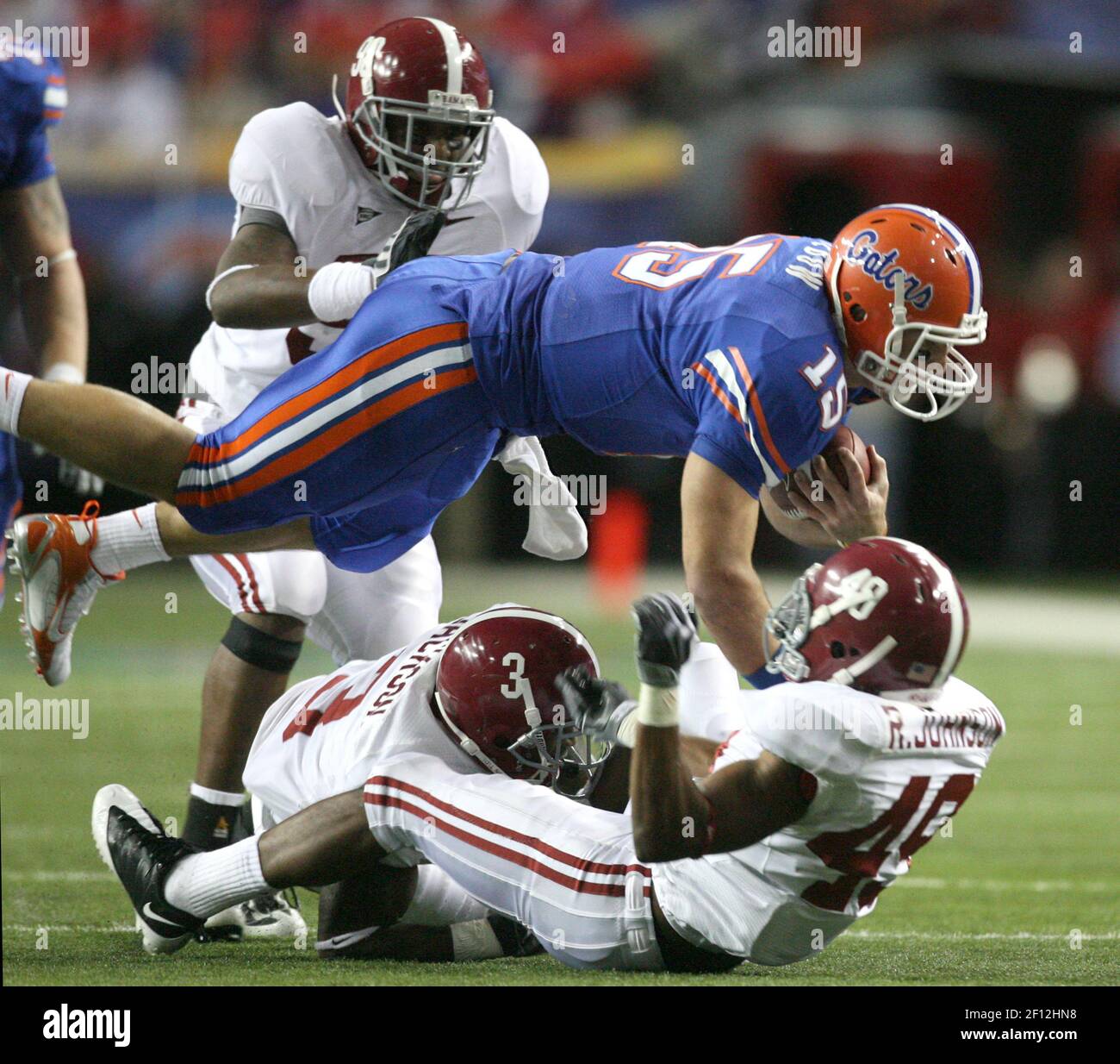 Florida quarterback Tim Tebow (15) dives for a first down during the ...