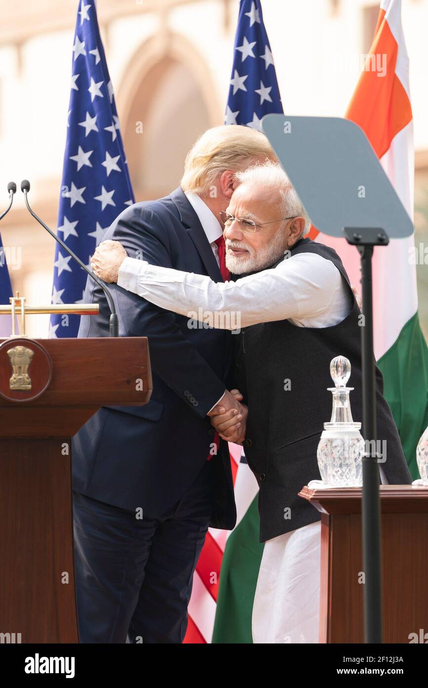 President Donald Trump and Indian Prime Minister Narendra Modi embrace at the conclusion of their joint press statement Tuesday Feb. 25 2020 on the lawn of Hyderabad House in New Delhi. Stock Photo