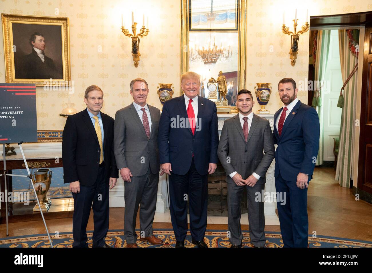 President Donald Trump poses with the 2019 NCAA Cornell University Men's Champion Wrestling team Friday Nov. 22 2019 during the NCAA Collegiate National Champions Day in the Blue Room of the White House. Stock Photo