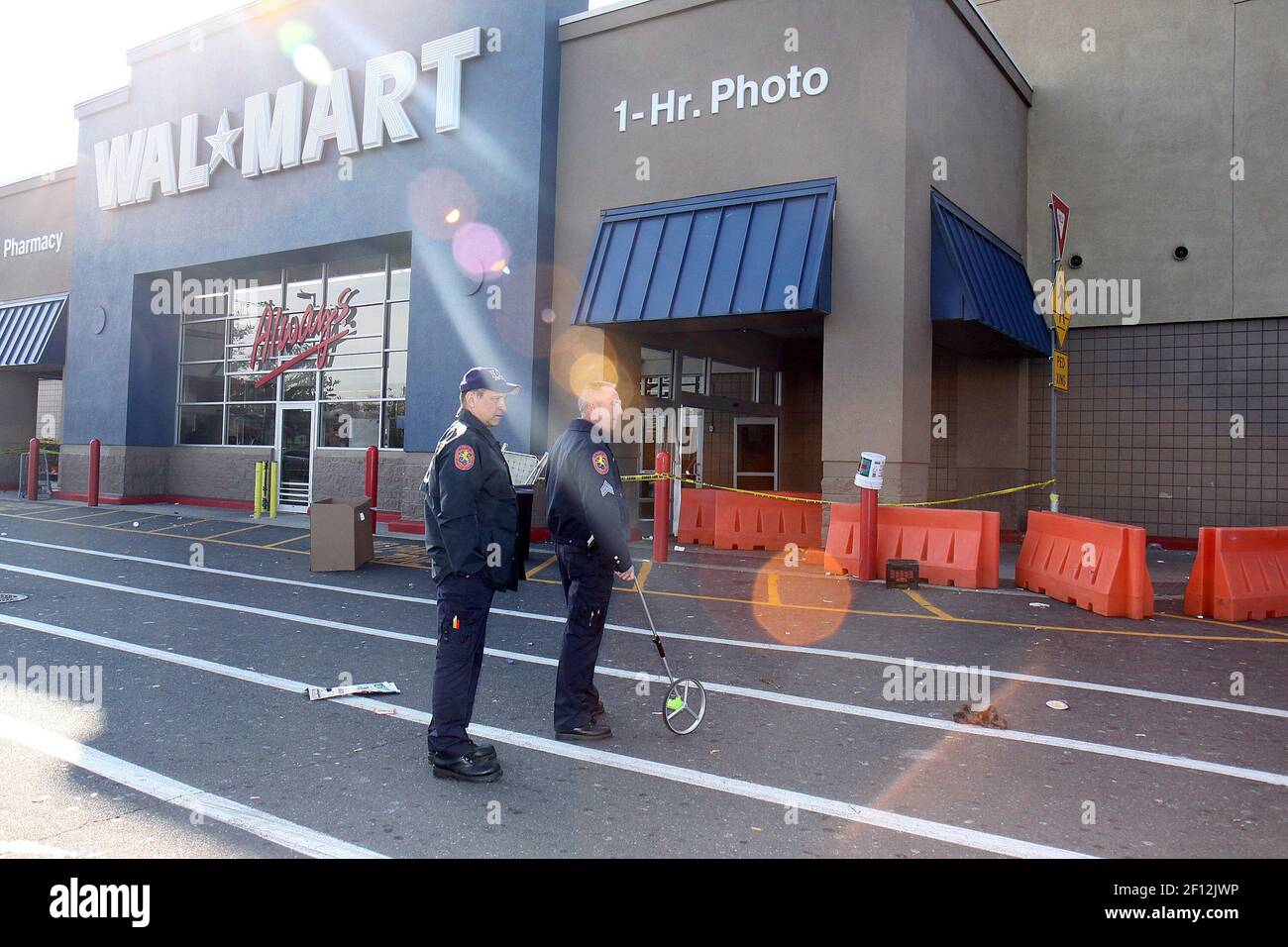 Nassau County Police secure the outside of Wal-Mart at Green Acres