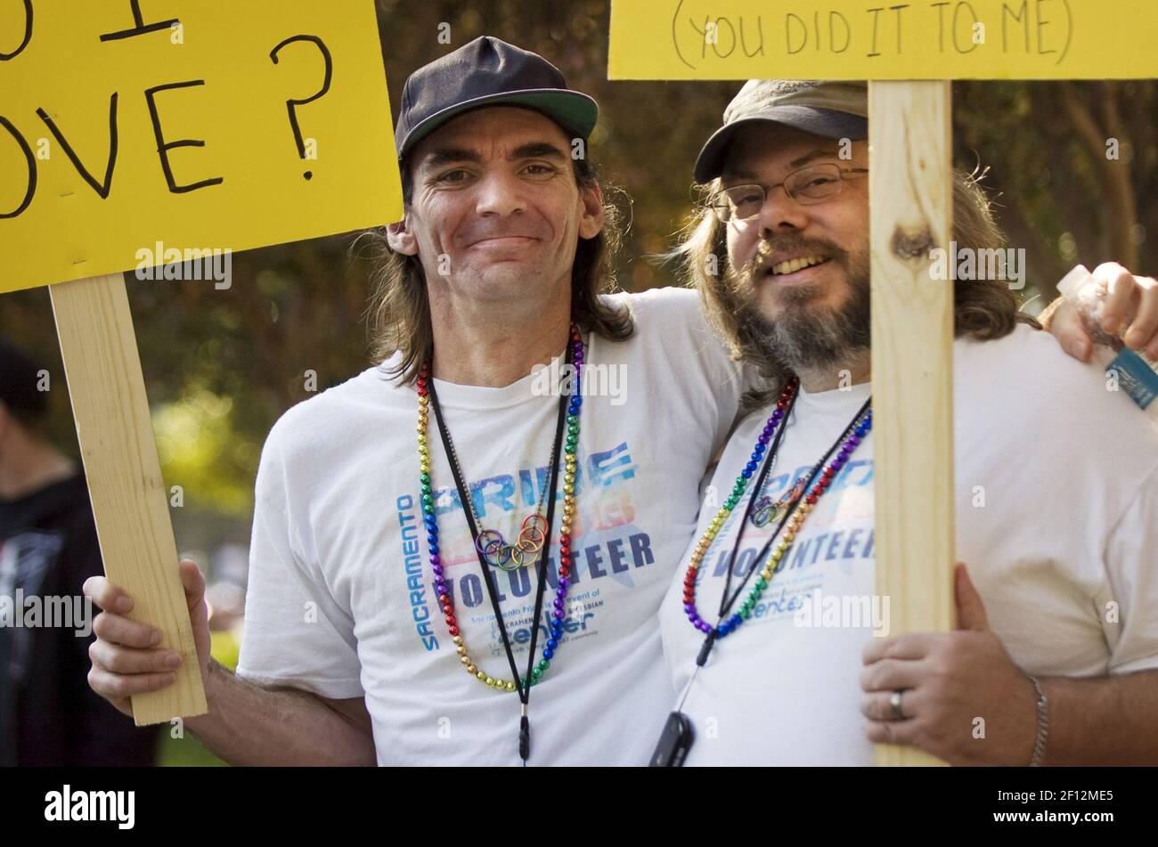 Sean Wheaton, left, and Jeff Wheaton show their solidarity during a gay rights rally protesting the passage of California's Proposition 8 on Saturday, November 13, 2008, in Sacramento, California. After 12 years together the couple was married on August 12, 2008. 'It took us 12 years to get married and if it takes another 12 everyone else will have the same rights,' Sean said. (Photo by Autumn Cruz/Sacramento Bee/MCT/Sipa USA) Stock Photo