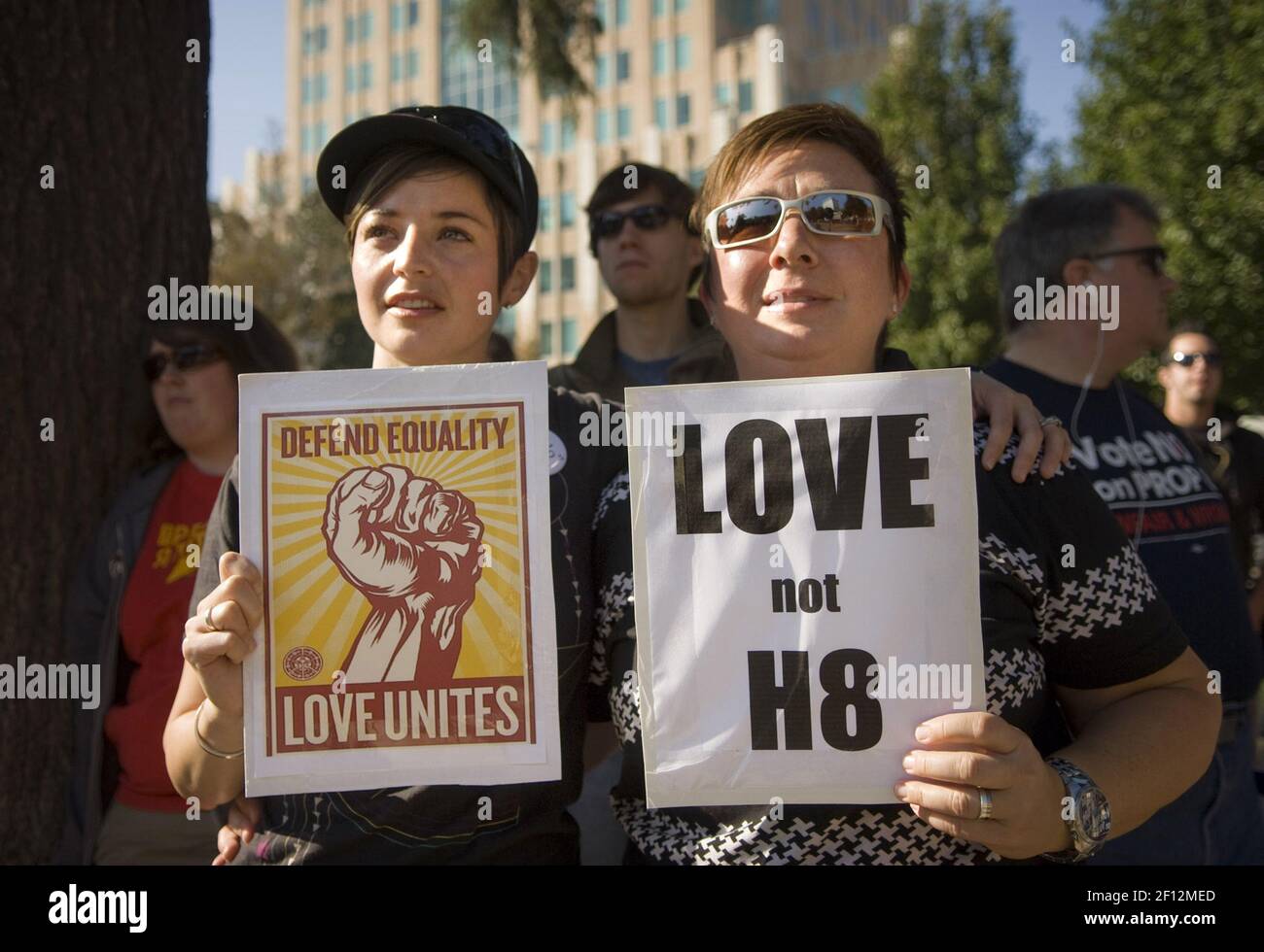Kelly McAllister, left, and her wife, Marci Burba, both of Sacramento, attend a gay rights rally protesting the passage of California's Proposition 8 at Cesar Chavez park on Saturday, November 13, 2008, in Sacramento, California. (Photo by Autumn Cruz/Sacramento Bee/MCT/Sipa USA) Stock Photo