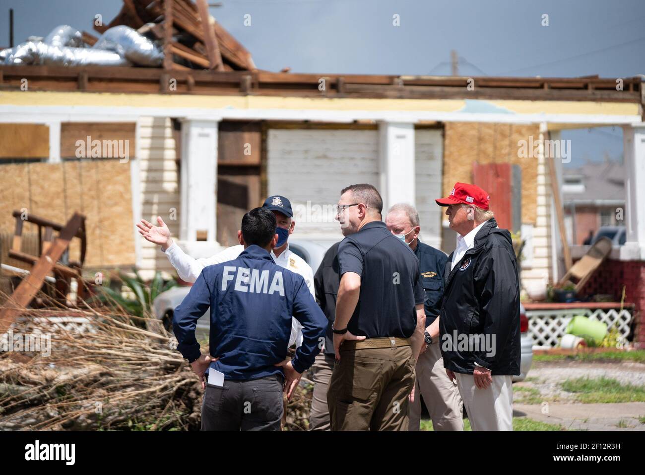 President Donald Trump visits a neighborhood Saturday Aug 29 2020 in Lake Charles La. to view damage caused by Hurricane Laura. Stock Photo