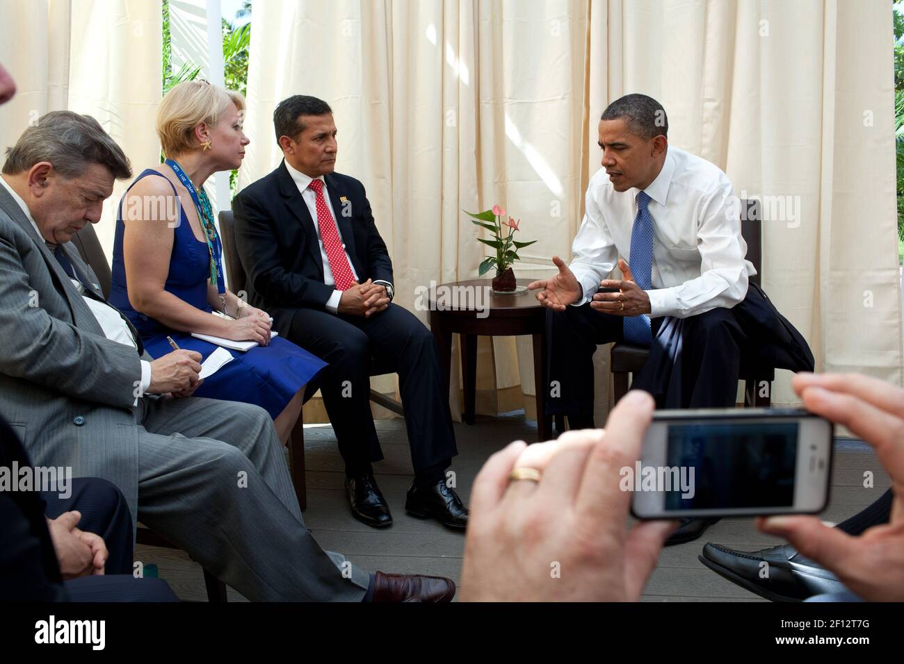 President Barack Obama meets with President Ollanta Humala of Peru during the APEC summit in Honolulu Hawaii Sunday Nov. 13 2011. Stock Photo