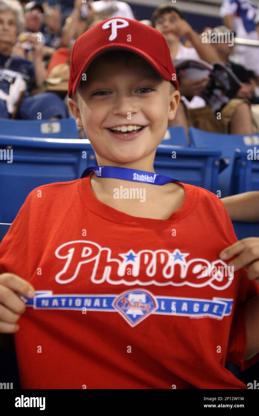 Gage Broderick, 8, of Cape Coral, Florida, shows off his Philadelphia  Phillies T-shirt before the start of Game 1 of the World Series between the  Tampa Bay Rays and Phillies at Tropicana