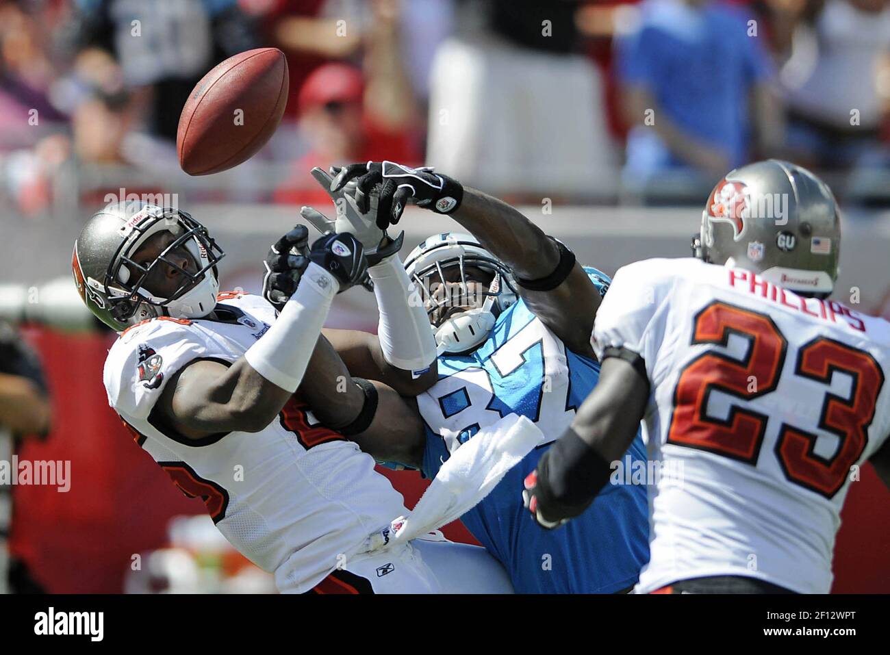Tampa Bay Buccaneers Aqib Talib 25 breaks up a pass intended for Carolina Panthers Muhsin Muhammad 87 in the end zone as Jermaine Phillips 23 comes in to intercept the ball late