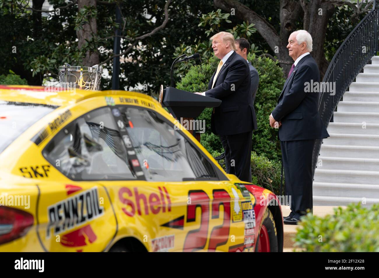 President Donald Trump honors 2018 NASCAR Cup Series Champion Joey Logano and team Penske owner Roger Penske Tuesday April 30 2019 on the South lawn of the White House. Stock Photo