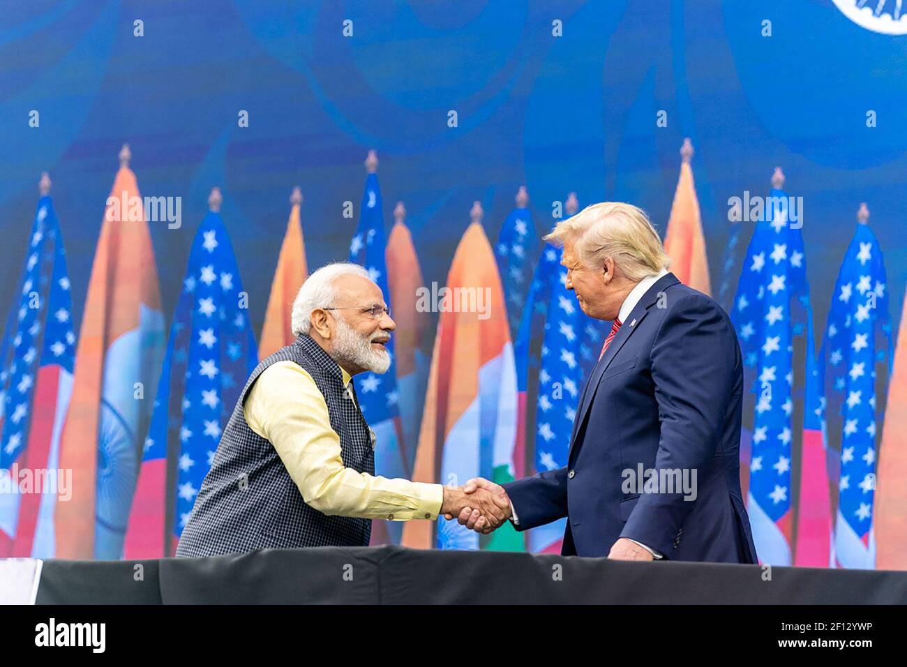 President Donald Trump shakes hands with Indiaâ€™s Prime Minister Narendra Modi as he is introduced to the podium Sunday Sept. 22 2019 at a rally in honor of Prime Minister Modi at NRG Stadium in Houston Texas. Stock Photo