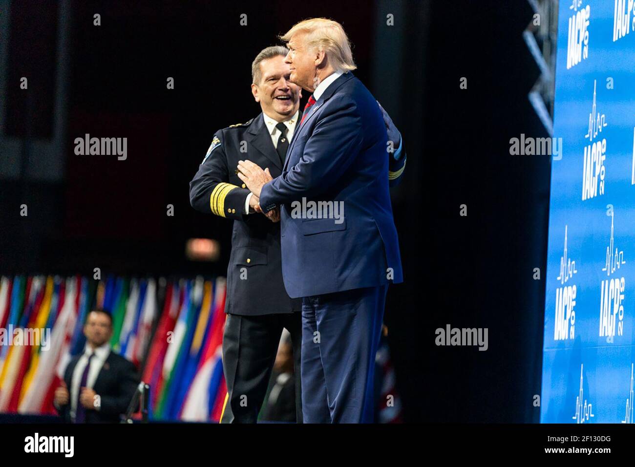 President Donald Trump is introduced by Chief Paul Cell at the International Association of Chiefs of Police Annual Conference and Exposition Monday Oct. 28 2019 at the McCormick Place Convention Center Chicago in Chicago. Stock Photo