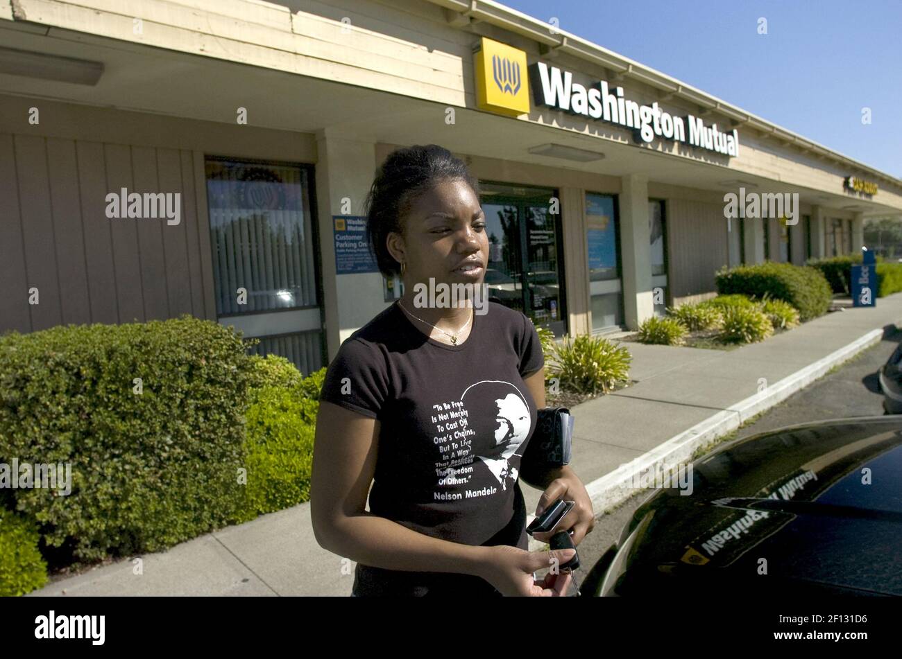 Marcellina Amonoo comes out of Washington Mutual Bank, on Friday, September 26, 2008. The bank has agreed to sell off its assets and some of its branches in Sacramento, California. (Photo by Lezlie Sterling/Sacramento Bee/MCT/Sipa USA) Stock Photo
