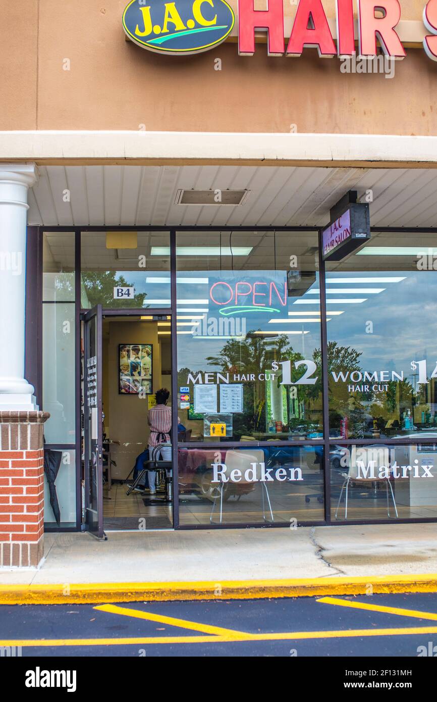 County, Ga / USA 07 09 20 J.A.C Hair Salon, person cutting