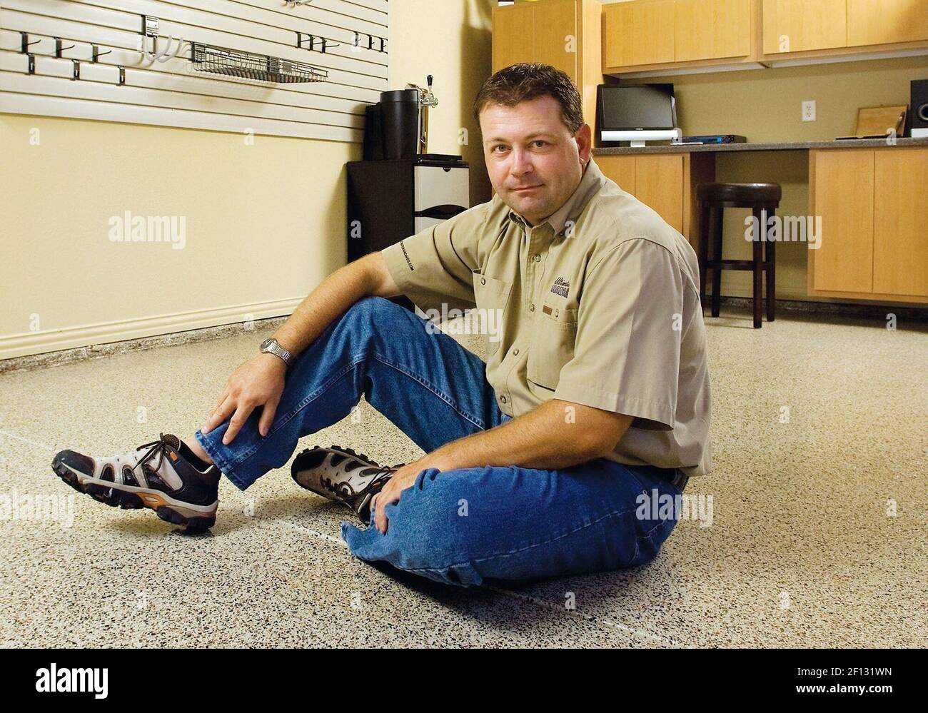 John Kontarski, who owns Ultimate Mancaves, updates garages for clients