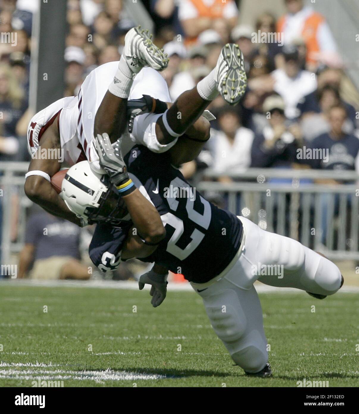 Penn State running back Evan Royster upends Temple defensive back ...