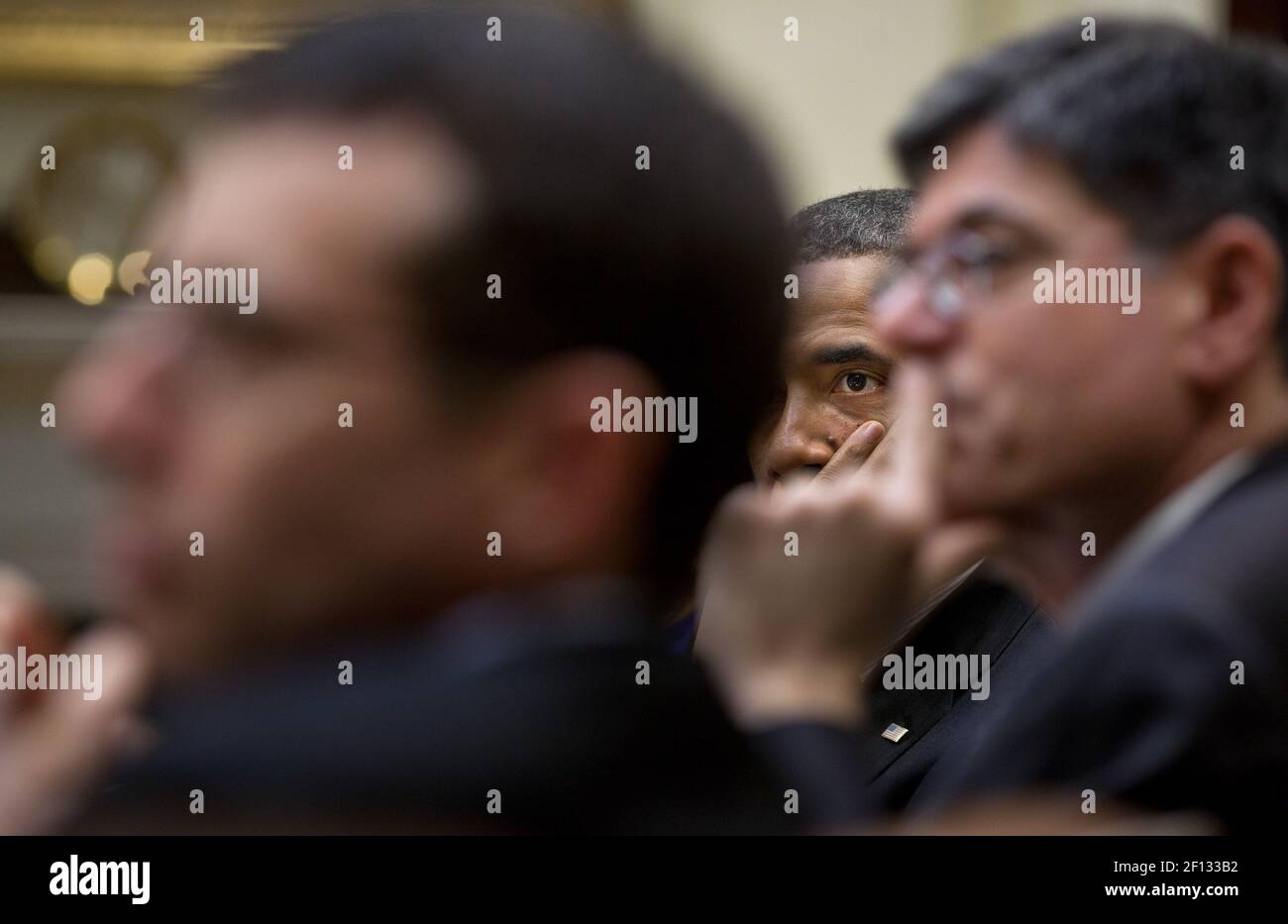 President Barack Obama listens during a meeting in the Roosevelt Room of the White House Feb. 29 2012. Stock Photo