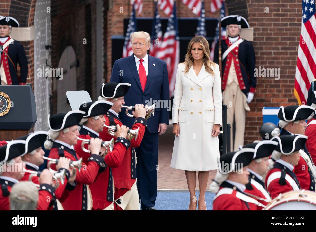 President Donald Trump and First Lady Melania Trump look on as the U.S. Army Old Guard Fife and Drum Corps perform during a Memorial Day ceremony at Fort McHenry National Monument and Historic Shrine Monday May 25 2020 in Baltimore. Stock Photo