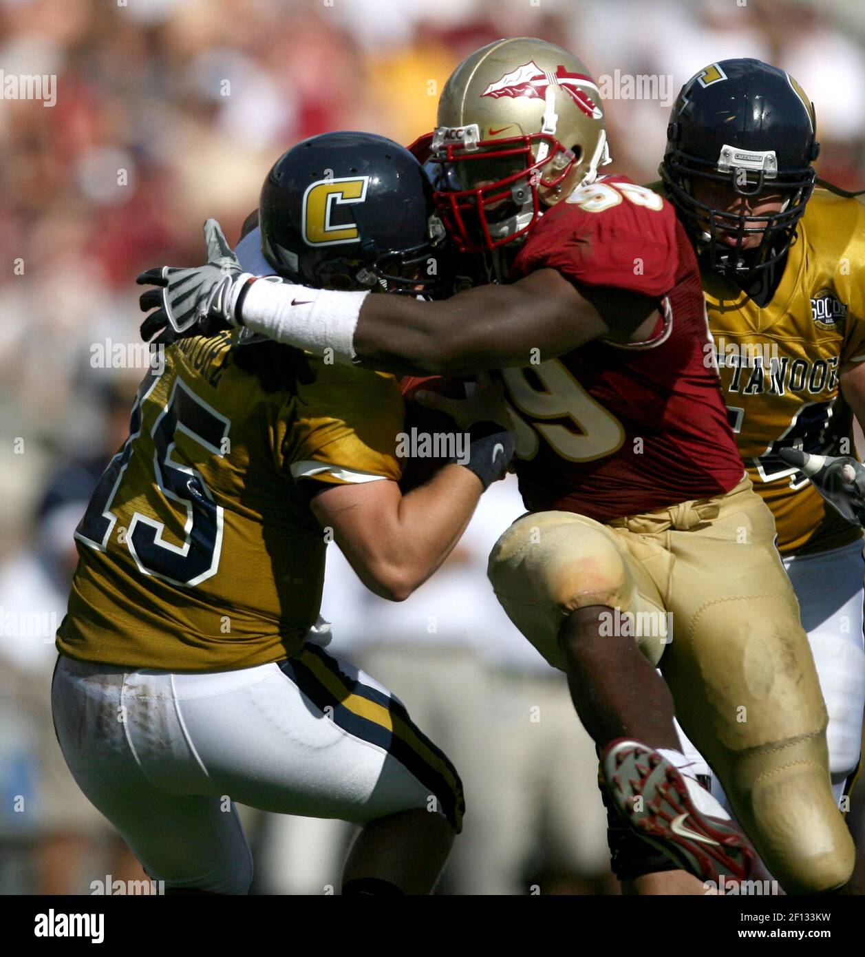 Florida State defensive lineman Everette Brown runs a football