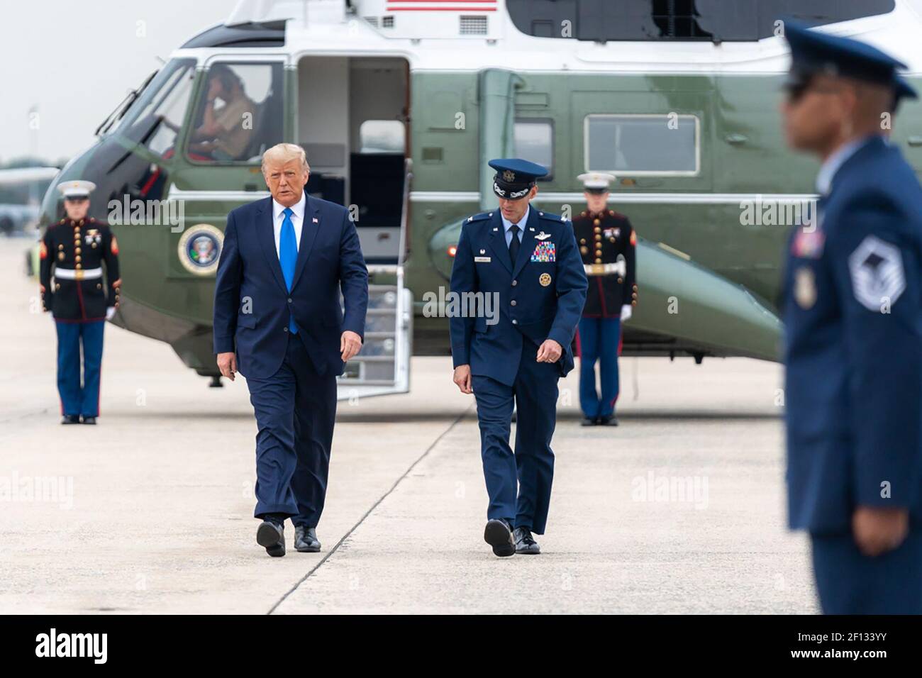 President Donald Trump disembarks Marine One at Joint Base Andrews Md. Thursday Sept. 24 2020 and is escorted to Air Force One by U.S. Air Force Col. Stephen Snelson Commander of the 89th Airlift Wing at Joint Base Andrews. Stock Photo