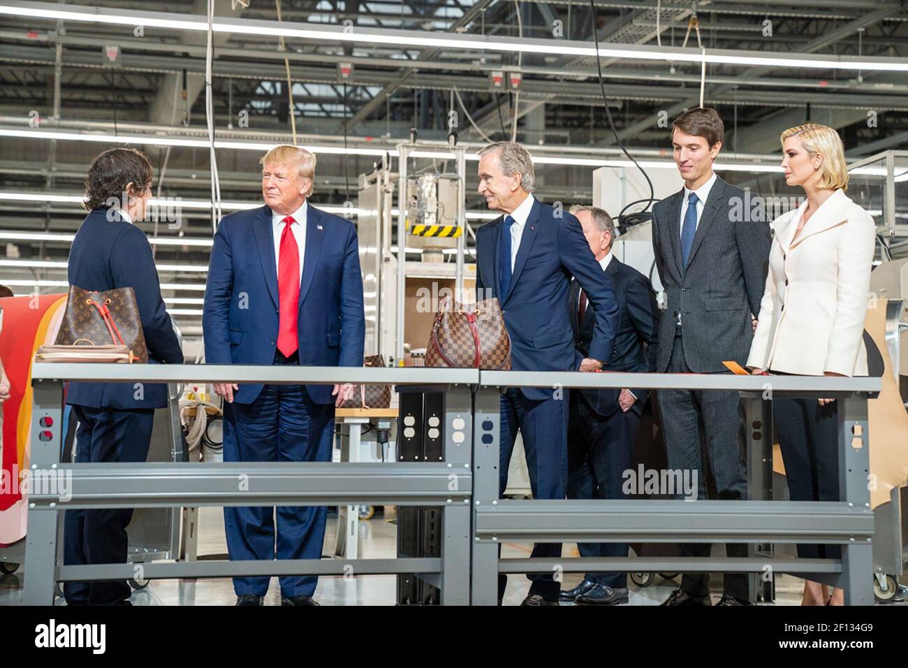 President Donald Trump is joined by Bernard Arnault CEO of LVMH Moet  Hennessy Carlos Sousa the general manager of Louis Vuitton Manufacturing  USA and Advisor to the President Ivanka Trump as they