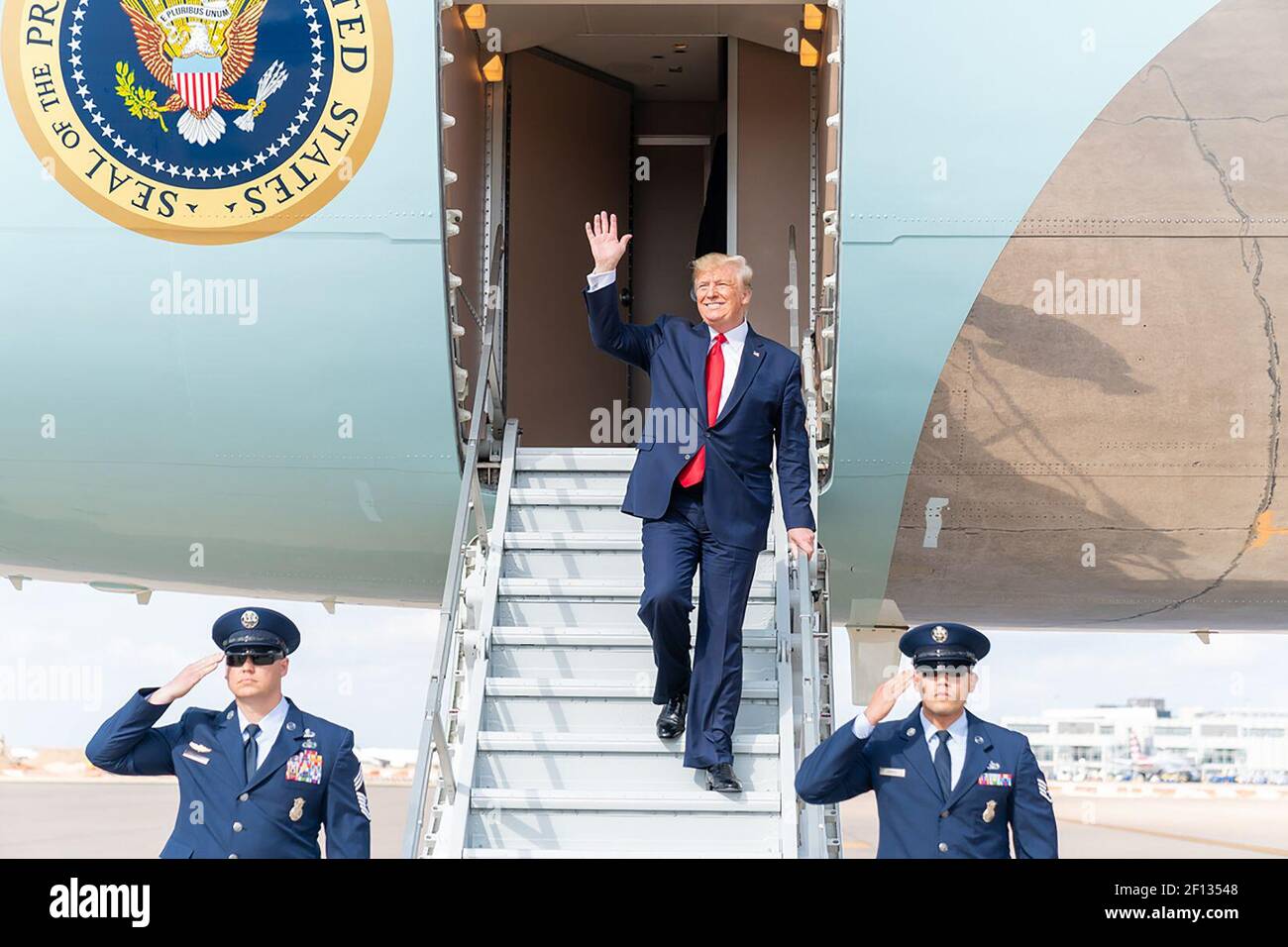 President Donald Trump disembarks Air Force One at Austin-Bergstrom International Airport in Austin Texas Wednesday Nov. 20 2019 where he was greeted by Texas Lt. Gov. Dan Patrick and Texas Attorney General Ken Paxton. Stock Photo