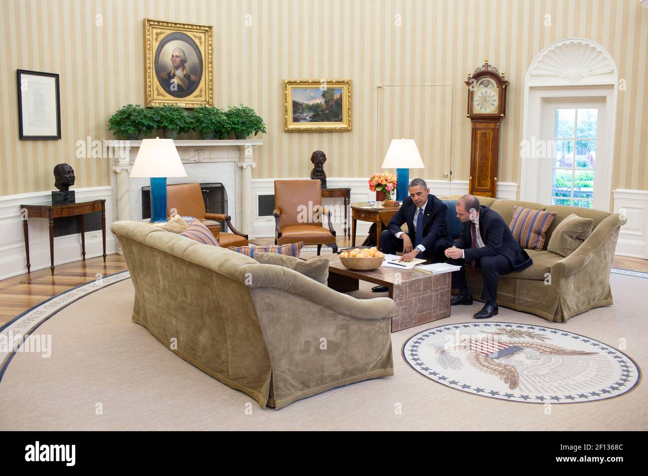 President Barack Obama meets with Ben Rhodes Deputy National Security Advisor for Strategic Communications in the Oval Office May 23 2013. Stock Photo