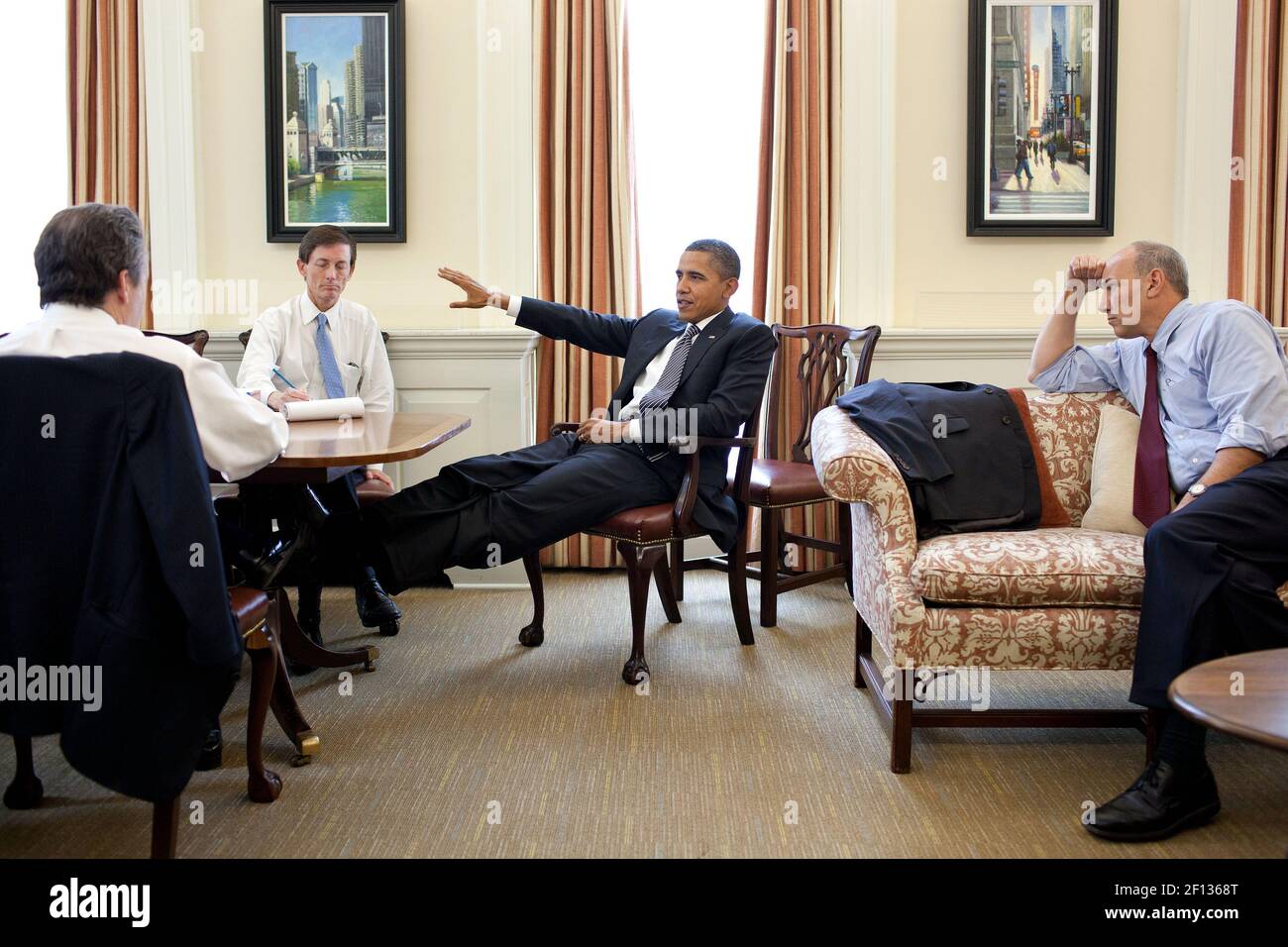 President Barack Obama meets with senior advisors in the Chief of Staff's West Wing Office, July 21, 2011. From left are: Gene Sperling; Bruce Reed and Phil Schiliro Stock Photo