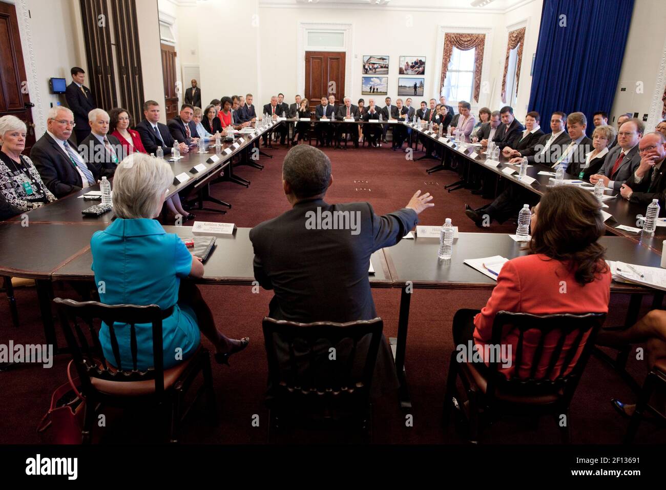 President Barack Obama Flanked By Health And Human Services Secretary Kathleen Sebelius Left And Labor Secretary Hilda L Solis Right Addresses An Insurance Commissioners Meeting In The Eisenhower Executive Office Building Of