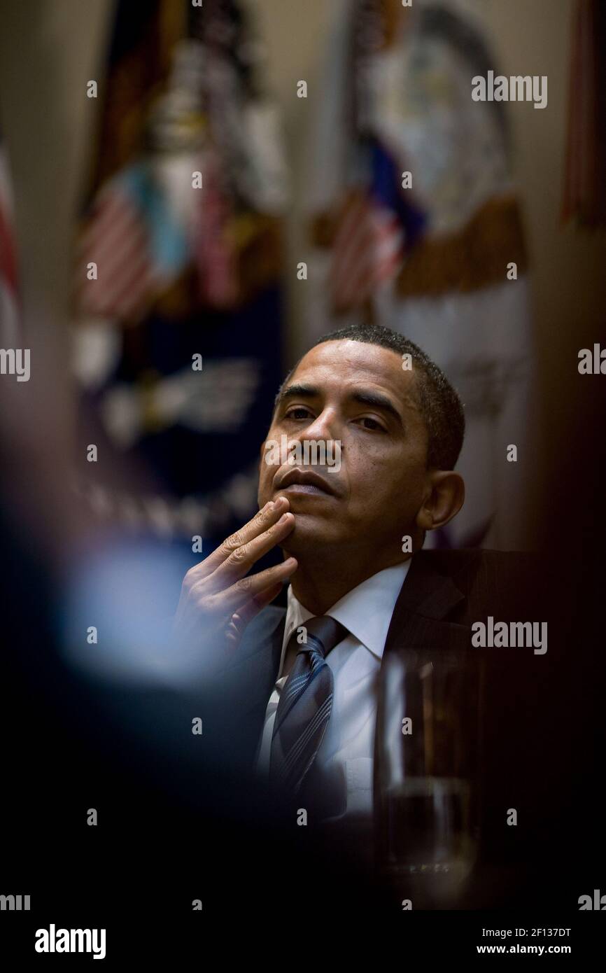 President Barack Obama listens during an economic policy briefing in the Roosevelt Room Nov. 3 2009. Stock Photo