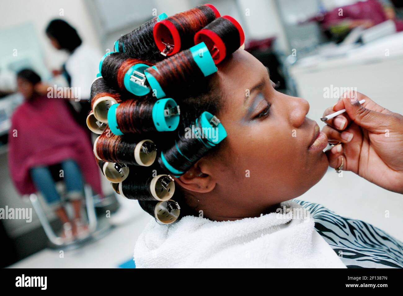 Deondra Gilbert of Charlotte receives a hair and beauty appointment at the  Dudley Beauty School campus in Charlotte, North Carolina. Beauty schools  offer salon appointments at more affordable prices, benefiting the consumer