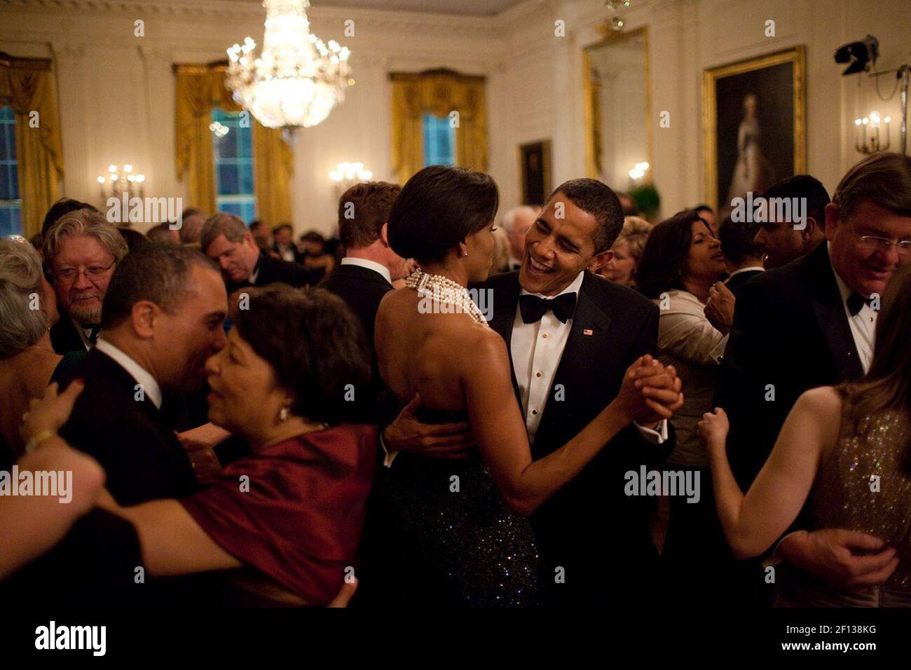 Feb. 22 2009; This was the first formal function at the White House in the Obama administration: the Governors Ball. The President dances with his wife while singing along with the band Earth Wind and Fire. Stock Photo