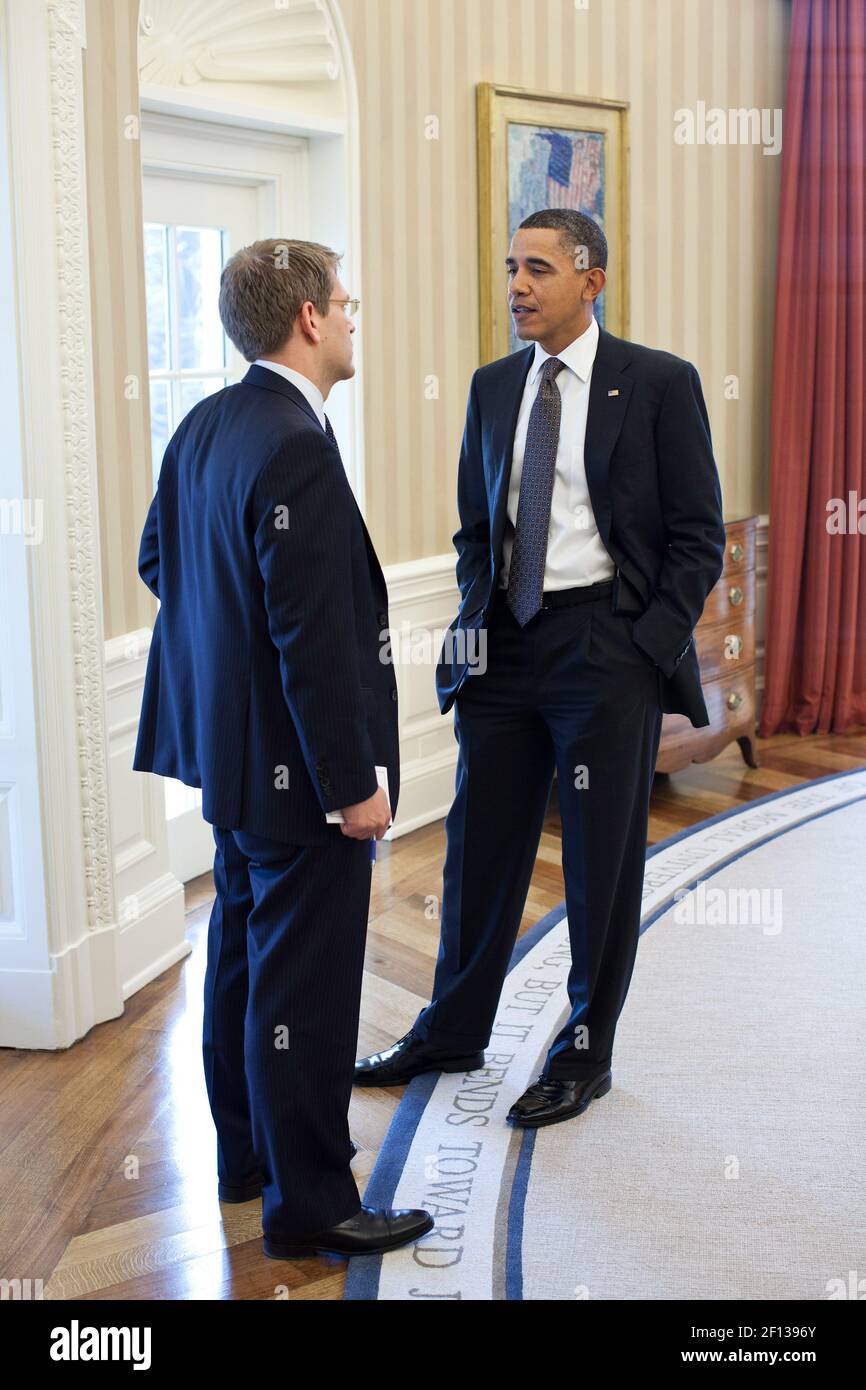 President Barack Obama talks with Press Secretary Jay Carney in the ...