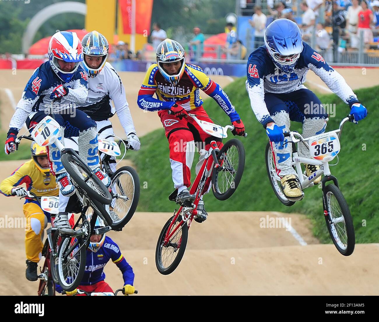 Riders fly over a jump in BMX racing on Wednesday, August 20, 2008, in the Games of the XXIX Olympiad in Beijing, China. (Photo by Jeff Siner/Charlotte Observer/MCT/Sipa USA) Stock Photo