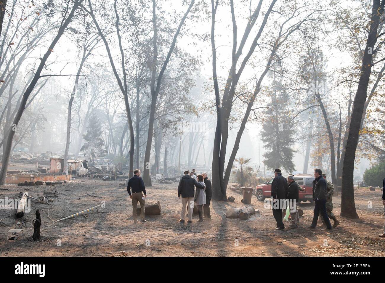 President Donald Trump is joined by California Governor Jerry Brown Governor-elect Gavin Newsom FEMA Administrator Brock Long and Paradise Calif. Mayor Jody Jones as he survey's the fire damage to Skyway Villa Mobile Home and RV Park Saturday Nov. 17 2018 in Paradise Calif. which was devastated by the Camp fire. Stock Photo