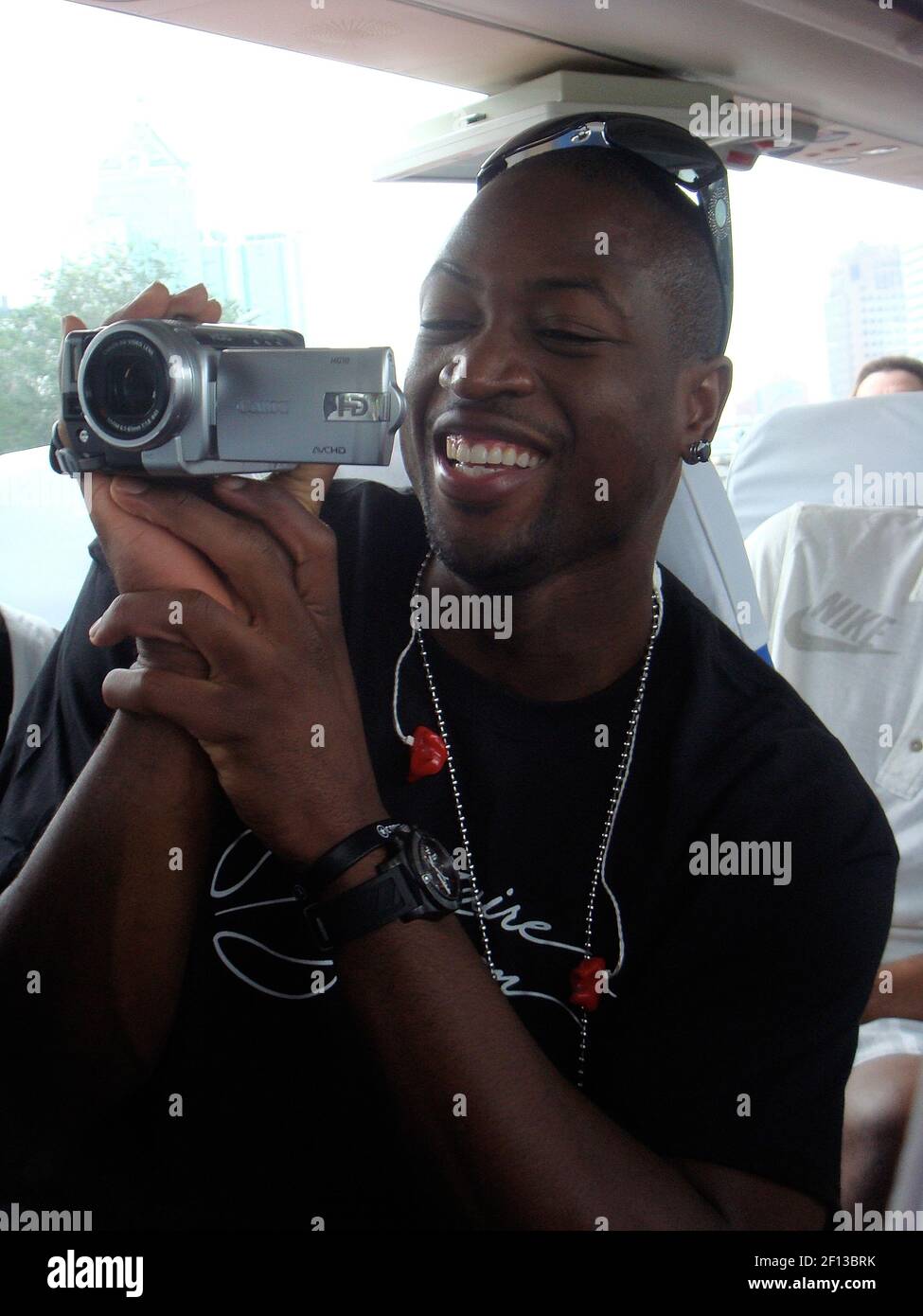 NBA star and USA Olympic basketball team member Dwyane Wade plays tourist taking in the Great Wall of China at Mutianyu on Sunday, August 17, 2008. (Photo by Courtesy Lisa Joseph/MCT/Sipa USA) Stock Photo