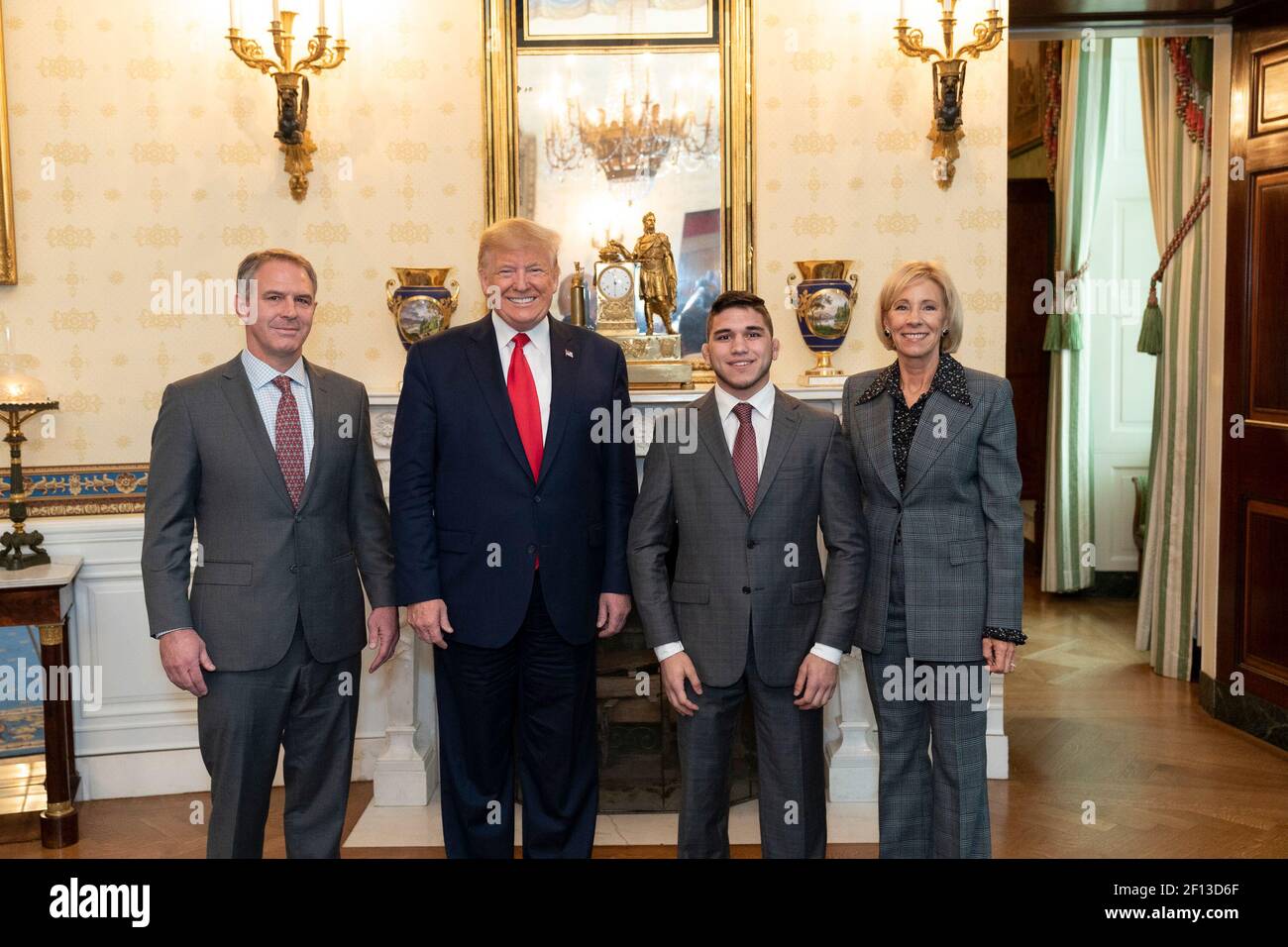 President Donald Trump poses with the 2019 NCAA Cornell University Men's Champion Wrestling team Friday Nov. 22 2019 during the NCAA Collegiate National Champions Day in the Blue Room of the White House. Stock Photo